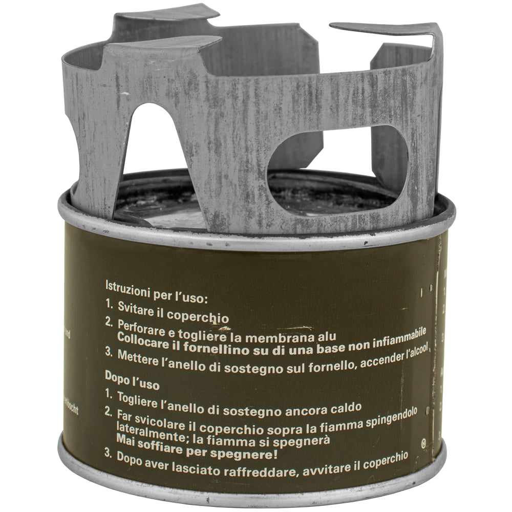 Swiss M71 Compact Stove with Fuel with grate on top of fuel source.