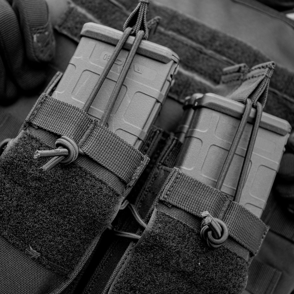 Quad AR Mag Stack on a tactical vest with mags inside.