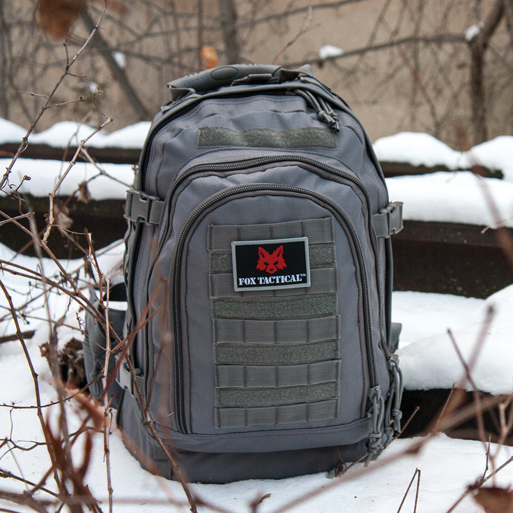 Tactical Duty Pack on snow-covered derelict train tracks.