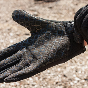 Person pulling on Ironclad® EXO Tactical Grip Series Glove.