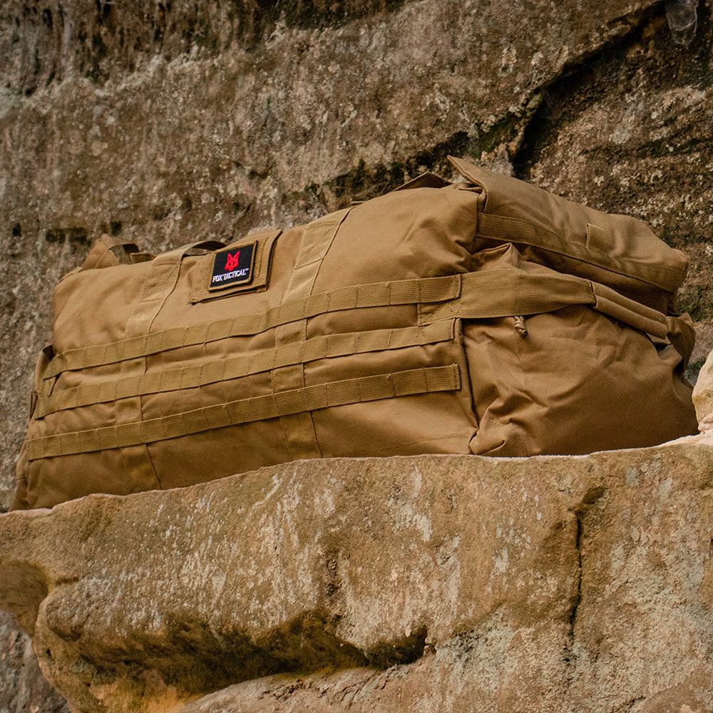 Jumbo Patrol bag proudly sits atop a limestone slab in a cave.