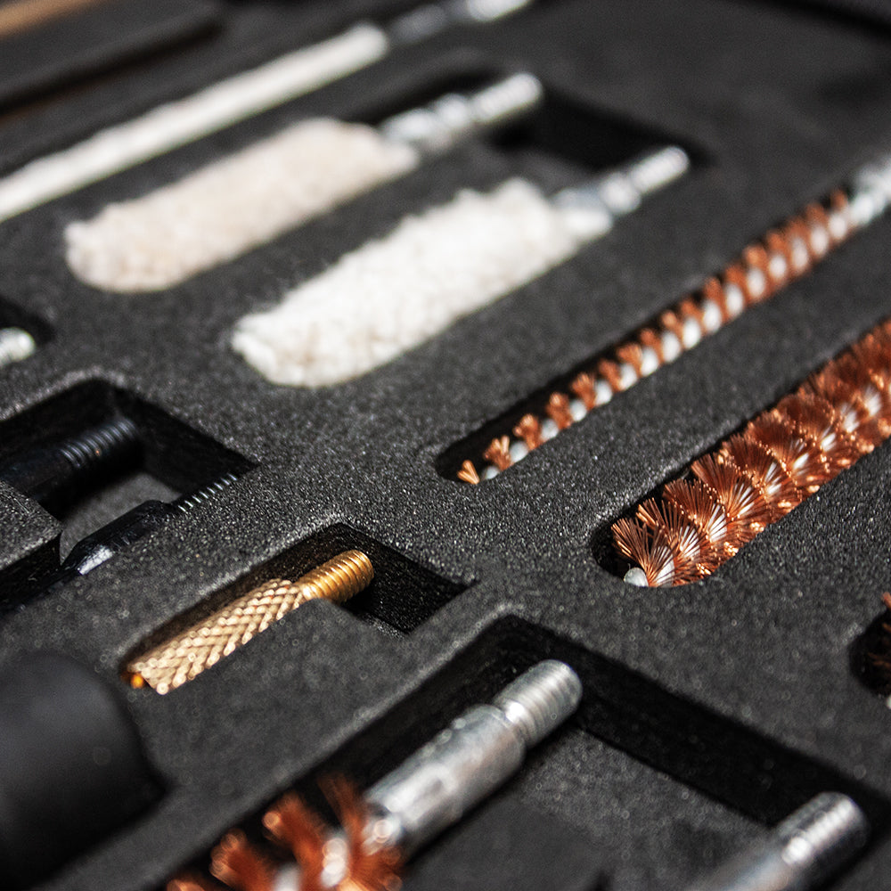 Close-up of inside of Deluxe Universal Pistol Cleaning Kit.