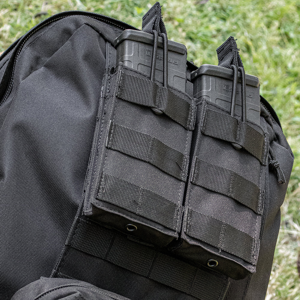 60-Round M4 Quick Deploy Pouch with mags inside on a tactical pack.