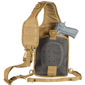 Back of Stinger Sling Pack with prop pistol in concealed carry pocket. 