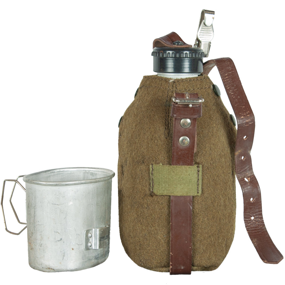 Romanian Military Aluminum Canteen with cup off and sat next to the canteen.