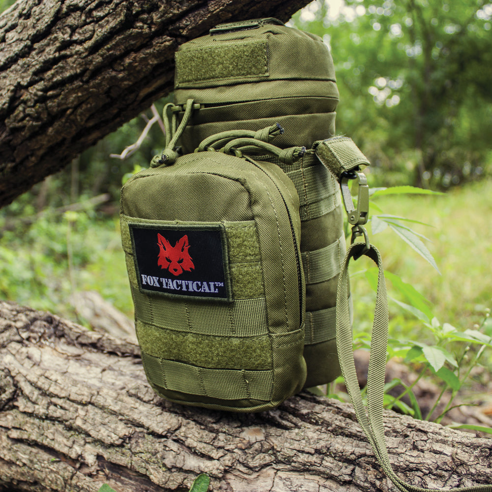 Hydration Carrier Pouch nestled between branches of a tree.